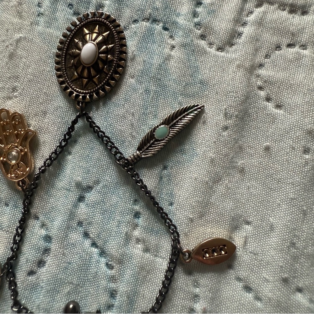 Elegant Multi-Charm Bracelet in Black and Gold - Picture 4 of 9